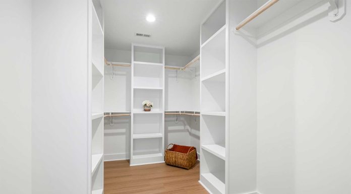 Transform Your Closet into a Luxury Haven: Discover Custom Designs that Maximize Space, Style, and Functionality! Luxurious custom walk-in closet by Amaya, designed for elegance, organization, and personal style.