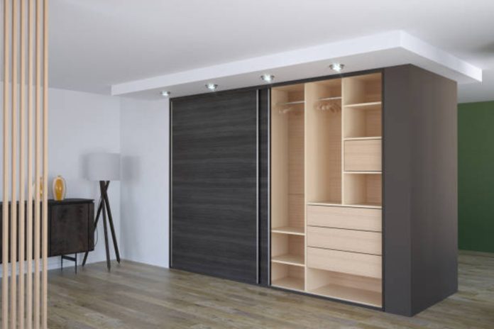 Luxury custom reach-in closet with adjustable shelving and smart lighting.