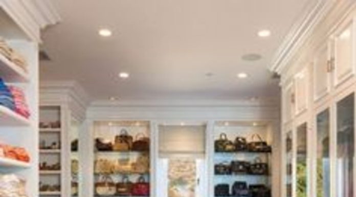 Transform Your Shoe and Handbag Closet into a Luxe Space with Our Custom Storage Solution! Luxury custom closet storage by Amaya, designed for elegant and functional organization.