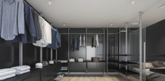 Seasonal Closet Solutions by Amaya – Style, Space, and Smart Organization Year-Round Custom closet with built-in seasonal storage solutions including coat racks, adjustable shelving, and shoe organizers.